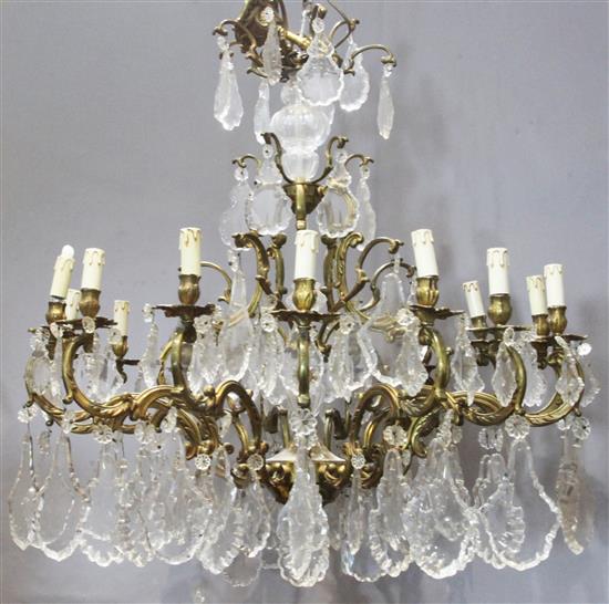 A gilt metal and cut glass fifteen light chandelier, width 36in.